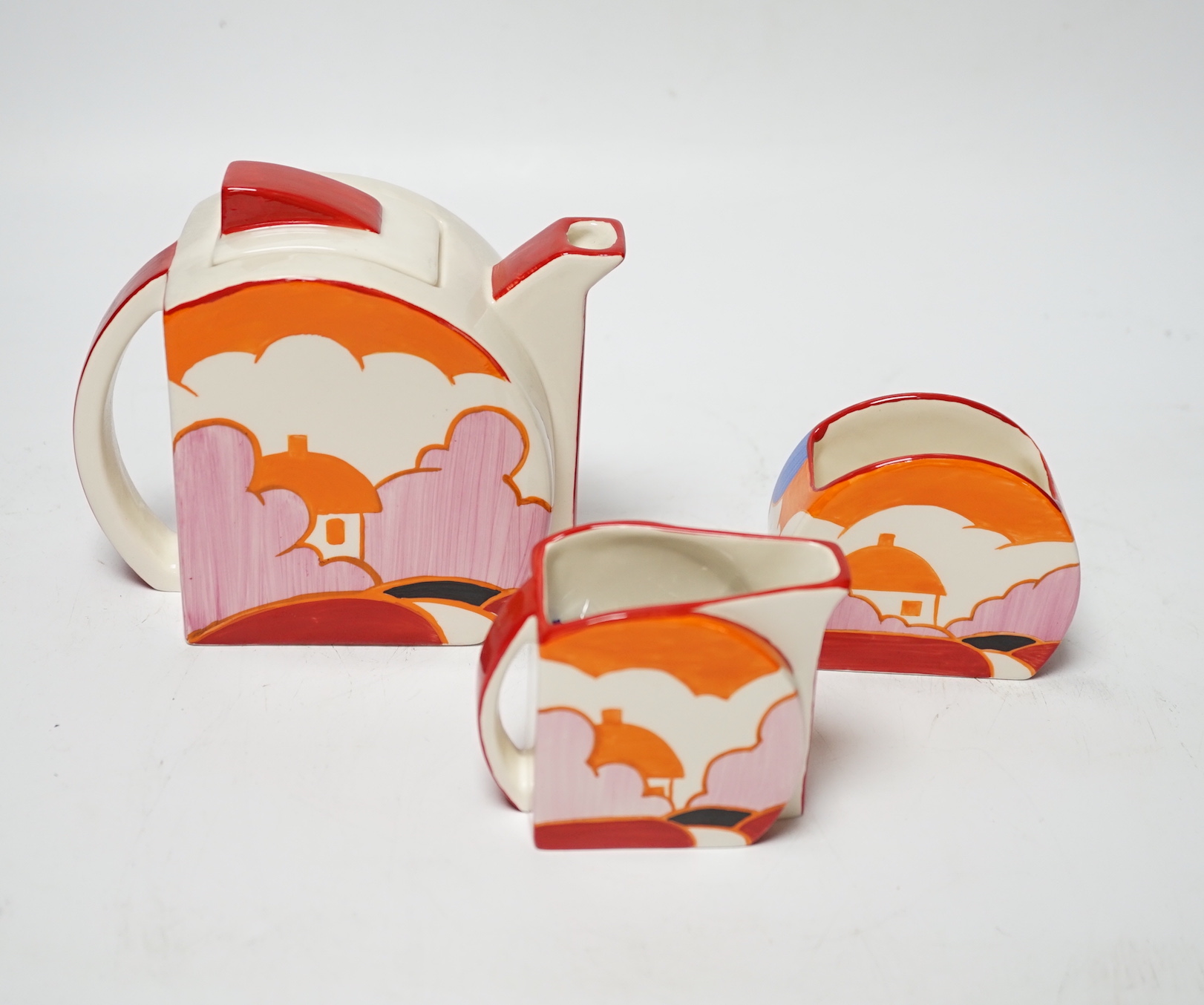 A Wedgwood Bizarre by Clarice Cliff Blue Autumn Stamford three piece tea set, limited edition with box and certificate, teapot and cover 12cm high